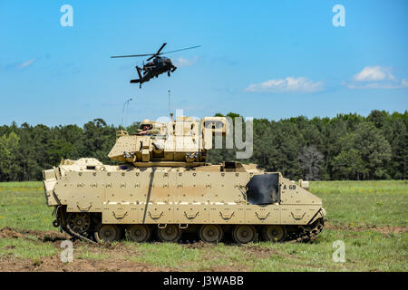 A U.S. Army M2A2 Bradley Fighting Vehicle, assigned to the 4-118th Combine Arms Battalion, during the South Carolina National Guard Air and Ground Expo at McEntire Joint National Guard Base, South Carolina, May 6, 2017. This expo is a combined arms demonstration showcasing the abilities of South Carolina National Guard Airmen and Soldiers while saying thank you for the support of fellow South Carolinians and the surrounding community. (U.S. Air National Guard photo by Tech. Sgt. Jorge Intriago) Stock Photo