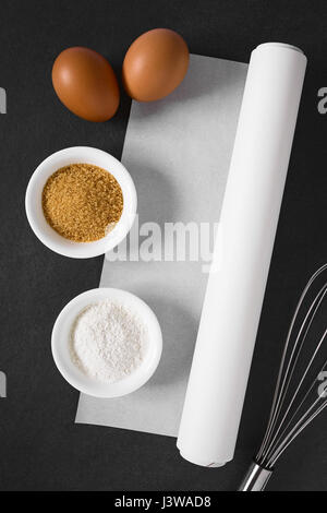 https://l450v.alamy.com/450v/j3wad8/roll-of-white-baking-paper-with-whisk-and-baking-ingredients-such-j3wad8.jpg