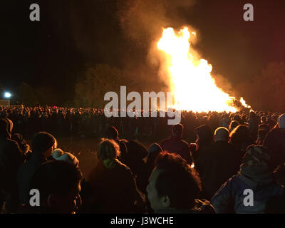 Lewes, England - 5 November 2016: Crowd gathering around the great bonfire of the yearly celebration of the Bonfire night festivities. Stock Photo