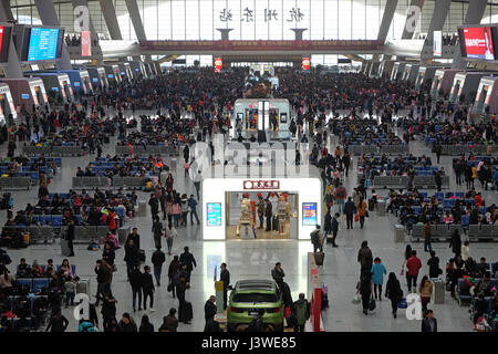 Passengers waiting for the train in the hall. Hangzhou East railway station is one of the largest railway hub in Asia Stock Photo