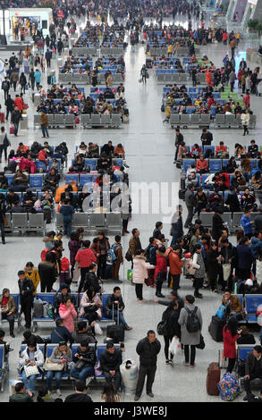 Passengers waiting for the train in the hall. Hangzhou East railway station is one of the largest railway hub in Asia Stock Photo