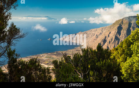 View over El Golfo collapse embayment, with Roques de Salmor sea stacks and the distant island of La Palma from Malpaso, El Hierro, Canary Islands Stock Photo