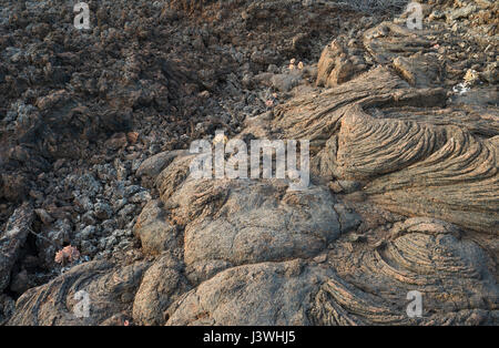 Basaltic lava flows with pahoehoe or ropy textures at Tacoron on the south coast of El Hierro, Canary Islands Stock Photo