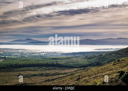 View northwards over the Golden Vale of Tipperary towards Slievenamon, from the Vee, Knockmealdown Mountains, County Tipperary, Ireland Stock Photo