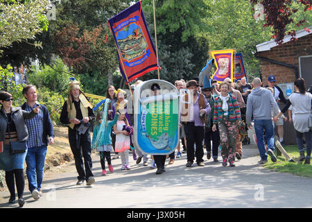 Seething Freshwater Sardine Festival. Seething Wells, Surbiton, Greater London, UK. 7th May 2017. Tongue-in-cheek celebration of freshwater sardine fishing in the River Thames with shanties sung as the Mighty Catch is landed at Queen's Promenade and then paraded to Claremont Gardens. A sardine BBQ, local-produce stalls and live bands complete this fishy entertainment. Organised to raise funds for local youth projects. Part of the Surbiton Food Festival. Credit: Ian Bottle/Alamy Live News Stock Photo