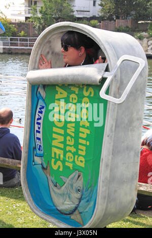 Seething Freshwater Sardine Festival. Seething Wells, Surbiton, Greater London, UK. 7th May 2017. Tongue-in-cheek celebration of freshwater sardine fishing in the River Thames with shanties sung as the Mighty Catch is landed at Queen's Promenade and then paraded to Claremont Gardens. A sardine BBQ, local-produce stalls and live bands complete this fishy entertainment. Organised to raise funds for local youth projects. Part of the Surbiton Food Festival. Credit: Ian Bottle/Alamy Live News Stock Photo