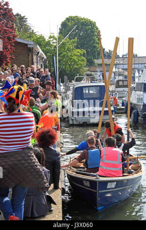 Seething Freshwater Sardine Festival. Seething Wells, Surbiton, Greater London, UK. 7th May 2017. Tongue-in-cheek celebration of freshwater sardine fishing in the River Thames with shanties sung as the Mighty Catch is landed at Queen's Promenade and then paraded to Claremont Gardens. A sardine BBQ, local-produce stalls and live bands complete this fishy entertainment. Organised to raise funds for local youth projects. Part of the Surbiton Food Festival. Credit: Ian Bottle/Alamy Live News Stock Photo