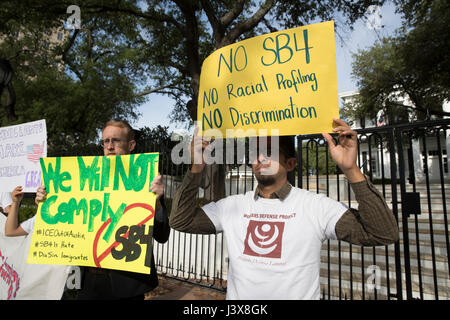 Austin, Texas, USA. 8th May, 2017. Immigrant Texans protest at the Texas Governor's Mansion downtown Austin after Gov. Greg Abbott privately signed on Faebook Live an anti-immigrant bill that would require Texas police officers to question immigration status on detained suspects. Credit: Bob Daemmrich/Alamy Live News Stock Photo