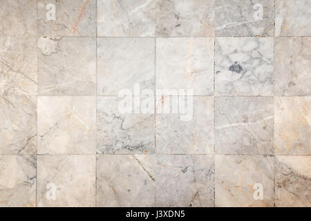 Close-up of a smooth marble floor with vignetting, viewed from above. Stock Photo