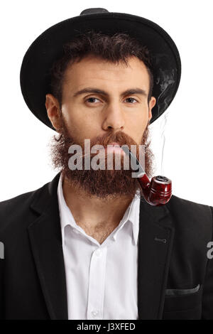Portrait of a bearded man smoking a pipe isolated on white background Stock Photo