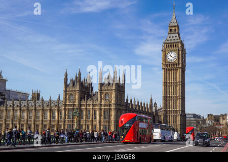 LONDON - 2017 APRIL 24 : There is tourism traffic everyday in London. Thousands cars, taxis, buses and pedestrians crossing River Thames on historic W Stock Photo