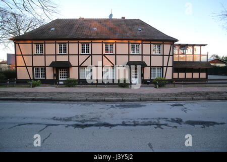 Half-timbered two-storey house in Weitenhagen, Mecklenburg-Vorpommern, Germany. Stock Photo