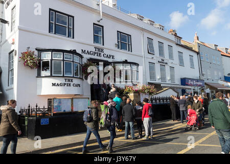 Queue Outside the Magpie Cafe in Whitby, North Yorkshire, UK Stock Photo