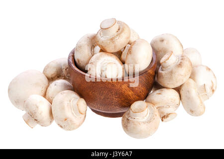 Mushroom champignon in wooden bowl isolated on white background