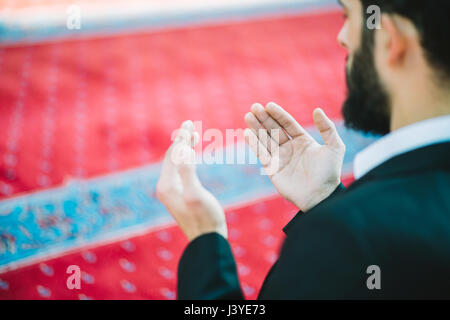 Muslim Arabic man praying Stock Photo