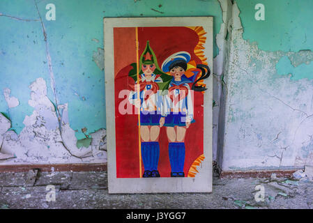 Old Soviet poster for children in High school No 3 in Pripyat ghost city of Chernobyl Nuclear Power Plant Zone of Alienation in Ukraine Stock Photo