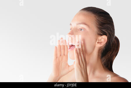 Woman speaks or shouts, voice Stock Photo