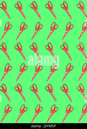 top view of a many red colored plastic scissors on green background Stock Photo