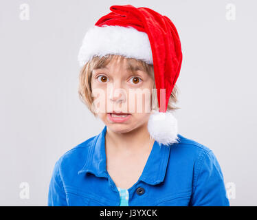Little girl in santa hat Stock Photo