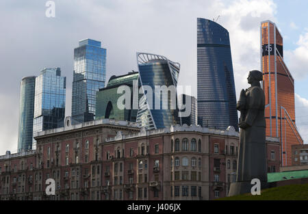 Skyscrapers of Moscow City and the woman soldier of the Hero City Obelisk, a monument to Lenin and to the men and the women who died in World War II Stock Photo