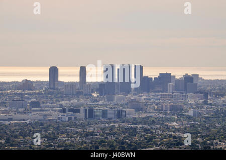 Los Angeles, USA - March 9, 2014: Cityscape or skyline of the LA city with smog during sunrise or sunset Stock Photo