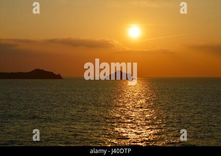 Sunset over The Mouls and Rumps Point Stock Photo