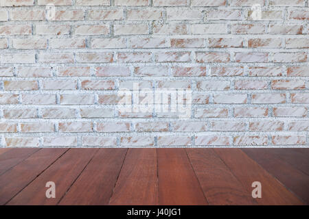 Background of old vintage dirty brick wall with peeling plaster, texture Stock Photo