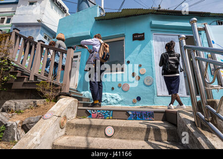 Alleyway with various signs in Gamcheon Culture Village, Busan Gwangyeoksi, South Korea Stock Photo
