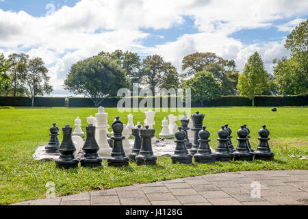 Large garden chess set in the sunshine Stock Photo