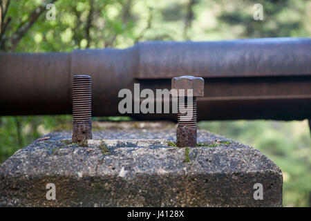 Nuts and bolts, one screw missing Stock Photo