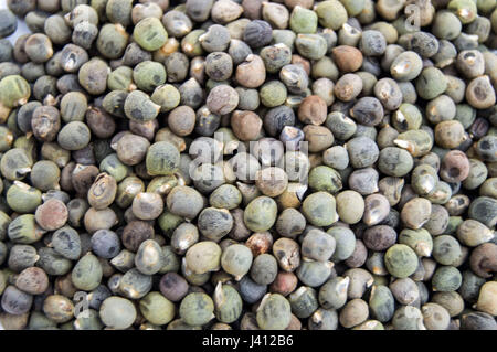 Ready to plant very clearly with white back ground okra seeds, okra seeds in the plate, Stock Photo