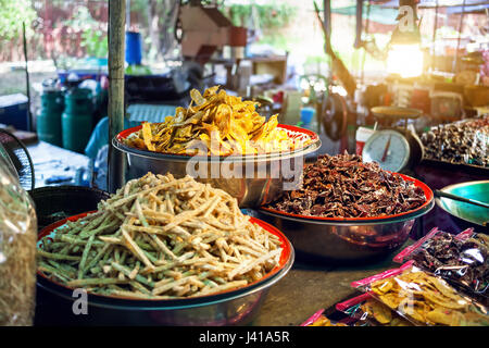 Thai food close up frying chips from fruits and vegetables in Traditional market at Thailand Stock Photo