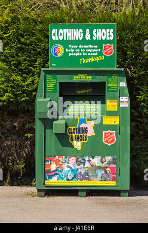 Clothing & shoes recycling bank for the Salvation Army in car park at Hampshire in May Stock Photo