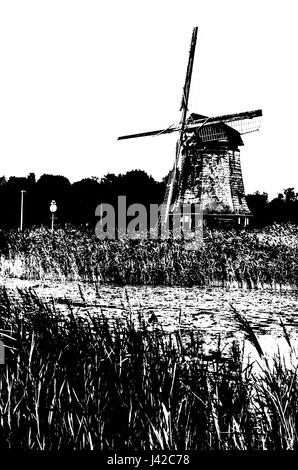 Black and white silhouette of a Dutch windmill Stock Photo