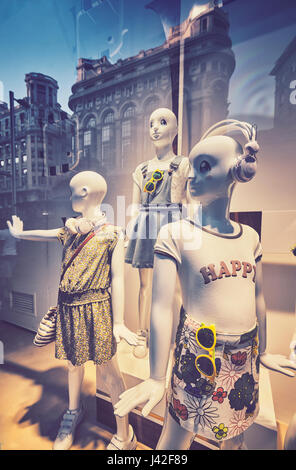 Mannequins and reflections at a window shop in Gran Via avenue. Madrid. Spain Stock Photo