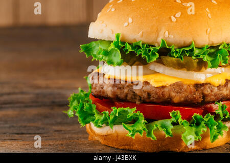 Homemade hamburger with fresh vegetables Classic deluxe cheeseburger Stock Photo