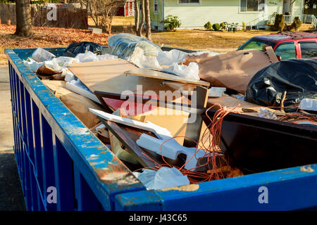 container Over flowing Dumpsters being full with garbage Stock Photo