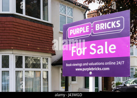 A Purple Bricks online estate agents' For Sale sign board. Stock Photo