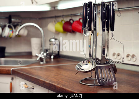 Kitchen utensils on  work top in modern kitchen Stock Photo