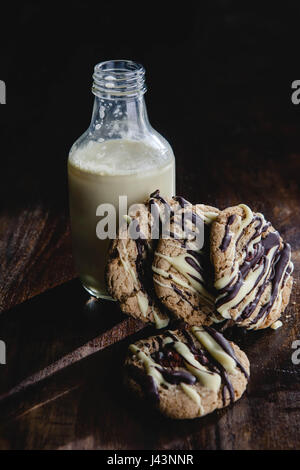 Old fashioned milk and cookies Stock Photo