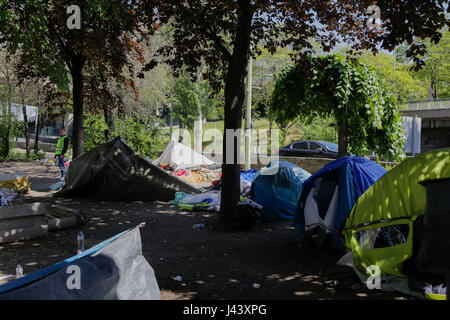 Paris, France. 9th May, 2017. The tents that are located under an overpass leading to ring road around Paris are abandoned after the eviction. City officials of Paris are cleaning the abandoned tents of the refugee camp that has spread around the reception centre. The camp was evicted earlier in the morning. Photo: Cronos/Michael Debets/Alamy Live News Stock Photo