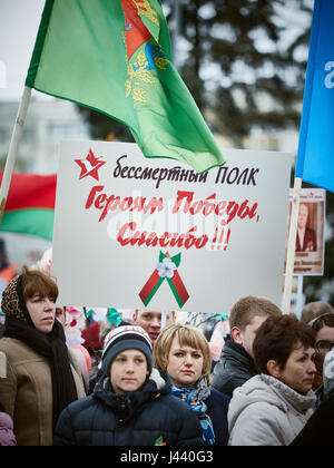 Vitebsk, Belarus. 9th May, 2017. The procession along the main street of the city. Participate in as the veterans of the great Patriotic war and young generation of Vitebsk. People give flowers to the elderly and lay wreaths at the monument 'Eternal Fire'. Credit: Alexey Vronsky/Alamy Live News Stock Photo