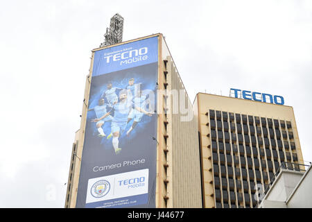 (170510) -- NAIROBI, May 10, 2017(Xinhua) -- Photo taken on May 9, 2017 shows an outdoor advertisement of Tecno Mobile in downtown Nairobi, capital of Kenya, May 9, 2017. Chinese mobile phone manufacturer Tecno Mobile sales reached 25 million devices, including 9 million smartphones in 2015, helping it to sustain the most 'popular' brand status in Africa. (Xinhua/Sun Ruibo) (jmmn) Stock Photo