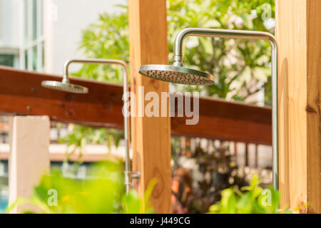 Shower at swimming pool Stock Photo