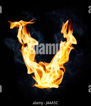 Letter V. Fire and smoke alphabet over black background Stock Photo