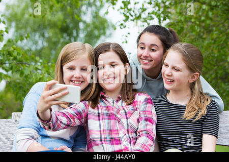 Premium Photo | A Teenager Taking a Group Selfie Joyful and Hugging Friends  Digital Native Gen Alpha Generation