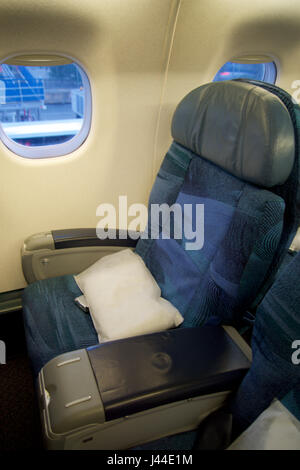 TORONTO, CANADA - JAN 28th, 2017: Air Canada Business class seats inside an Embraer ERJ-190 from AC. Air Canadas Embraer ERJ-190 business class on this configuration consists of a total of 9 seats, 1-2 layout in Executive class Stock Photo