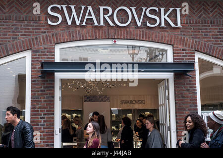 Roermond, Netherlands 07.05.2017 - Logo and shop of Swarovski Store Mc Arthur Glen Designer Outlet shopping area Stock Photo