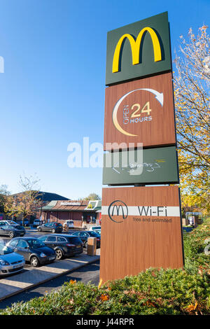 Sign for a McDonald's 24 hour Drive Thru restaurant with wi fi, Nottingham, England, UK Stock Photo