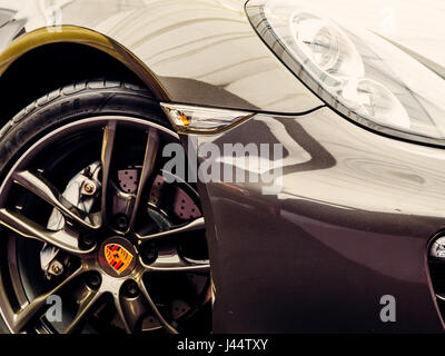 High performance expensive Porsche motor cars awaiting breaking down